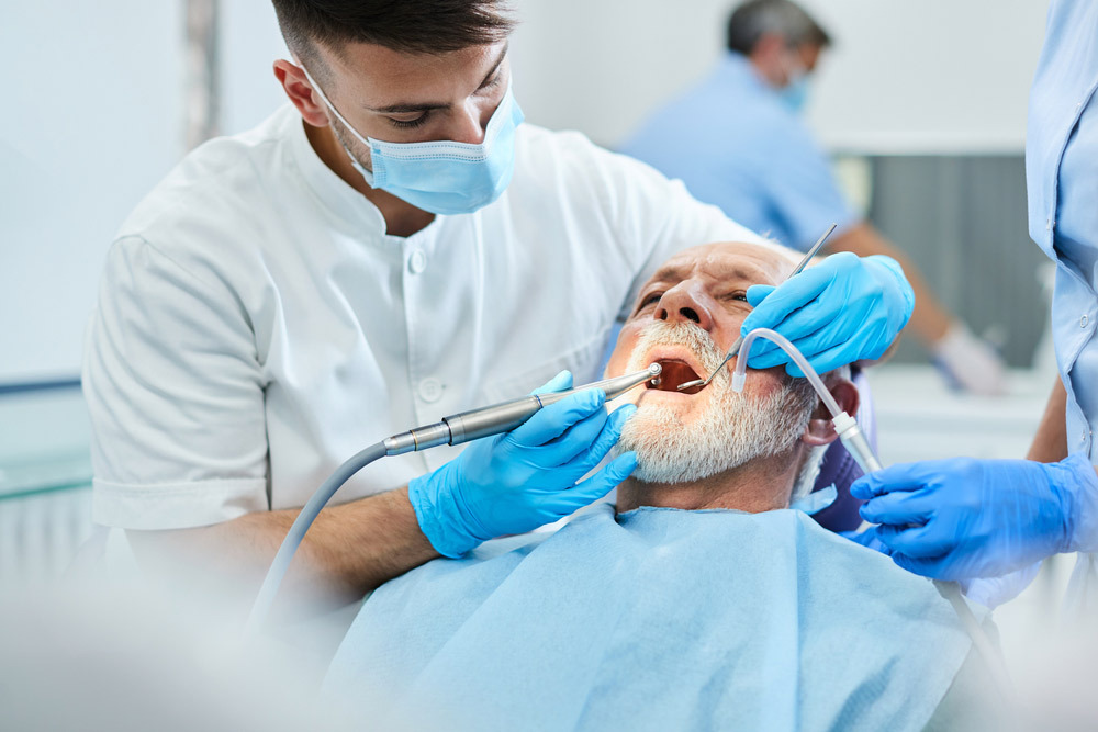 Dentist serving patient